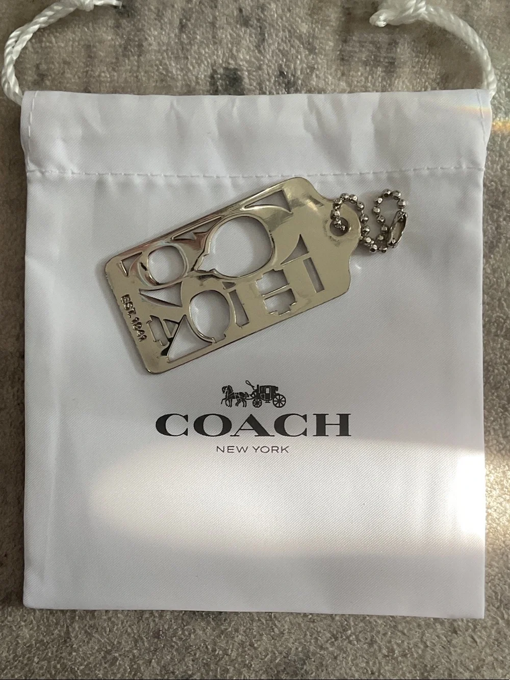 COACH Silver-tone Cutout Logo Tag